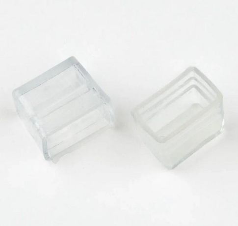 Изолирующий зажим заглушка UCW-N12 CLEAR 025 POLYBAG для светодиодных лент ULS-N12 NEON 24В 13x26мм цвет прозрачный 25 штук в пакете - UL-00009278 Uniel